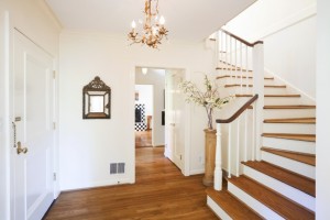 A picture of a bright, modern hallway and stairs in a contemporary Lytham home