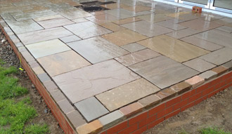 image of groundworks set on a patio in the back garden of a property