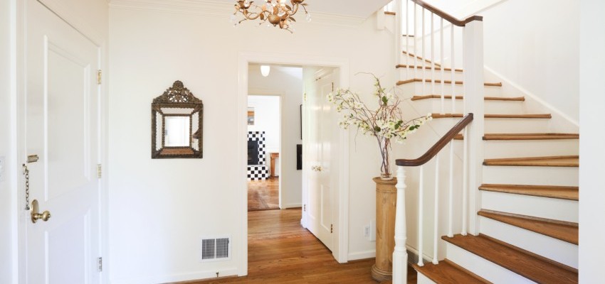 A picture of a bright, modern hallway and stairs in a contemporary Lytham home